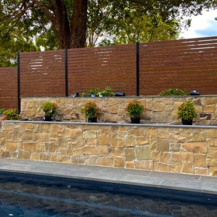 PPM Natural Stone backyard swimming pool retaining wall